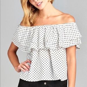 Women’s white poka dot off/on the shoulder shirt.